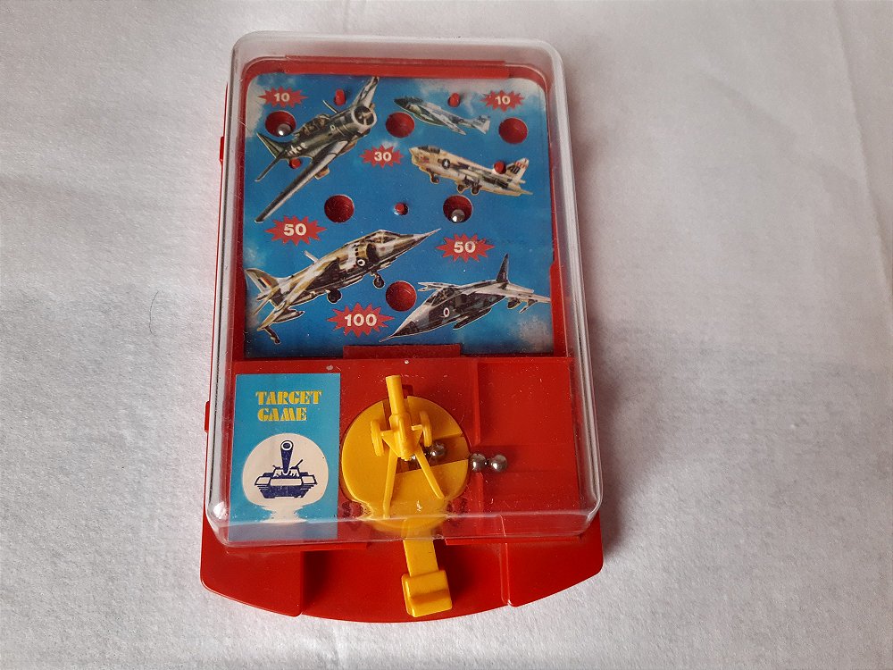 Brinquedo vintage anos 80 portátil Target Game com esferas de aço usado  BlueBox - Taffy Shop - Brechó de brinquedos