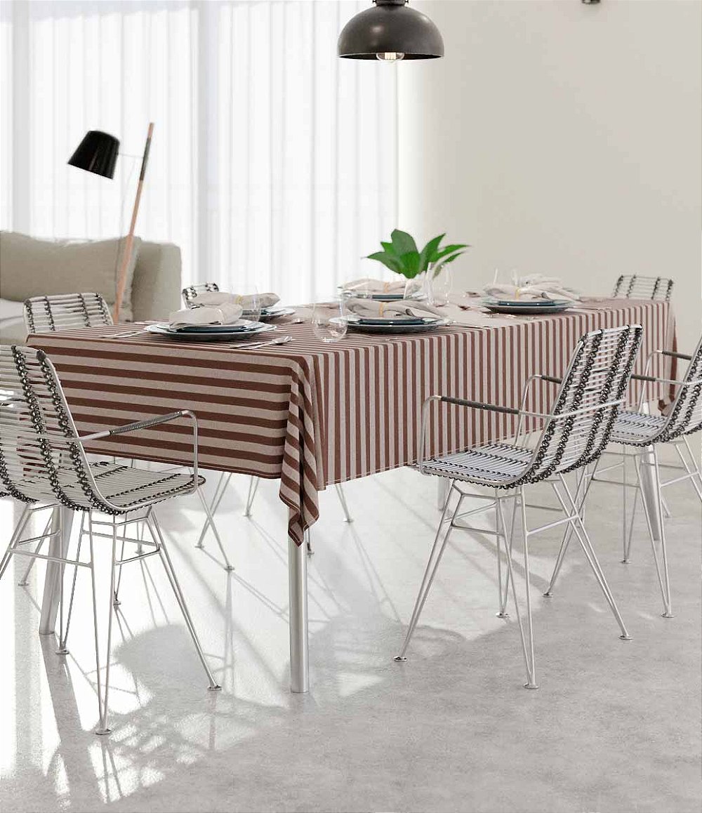 mesa retangular em sala de estar com toalha de mesa marrom listrada e centro de mesa com planta