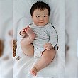 Boneca Bebê Reborn Dani Realista 60cm + Unicórnio