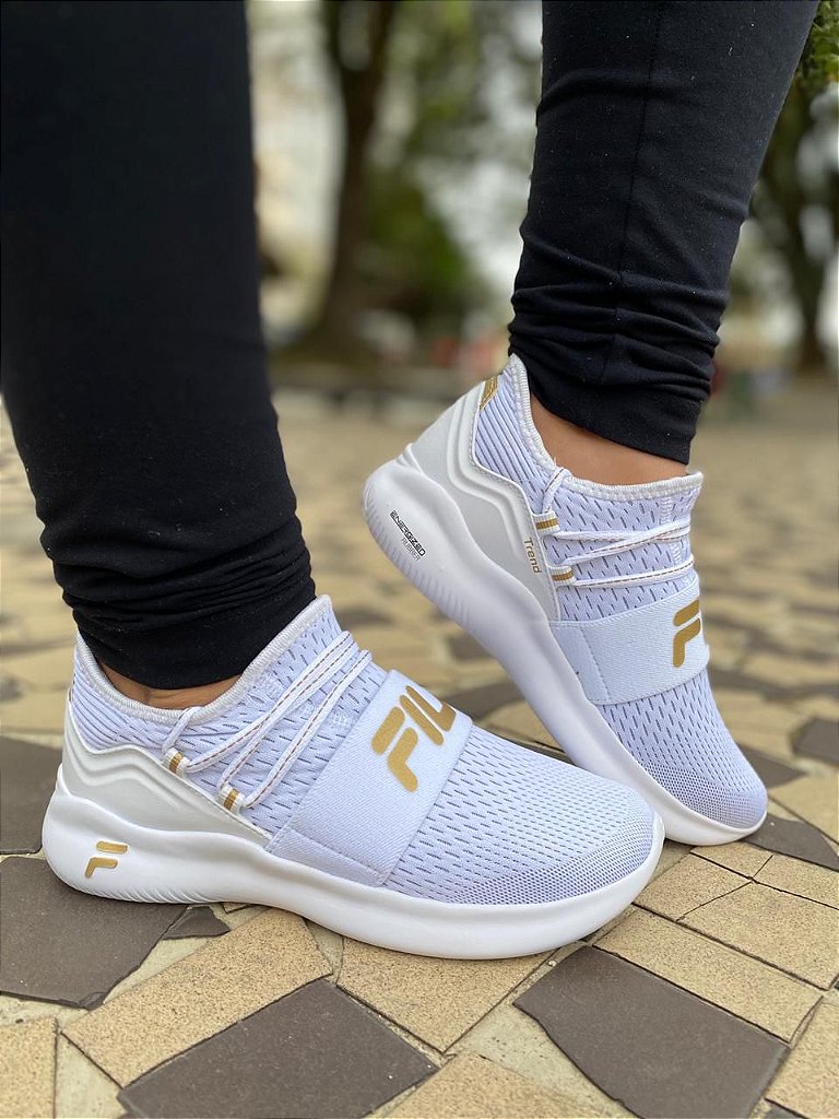 tenis fila branco e dourado