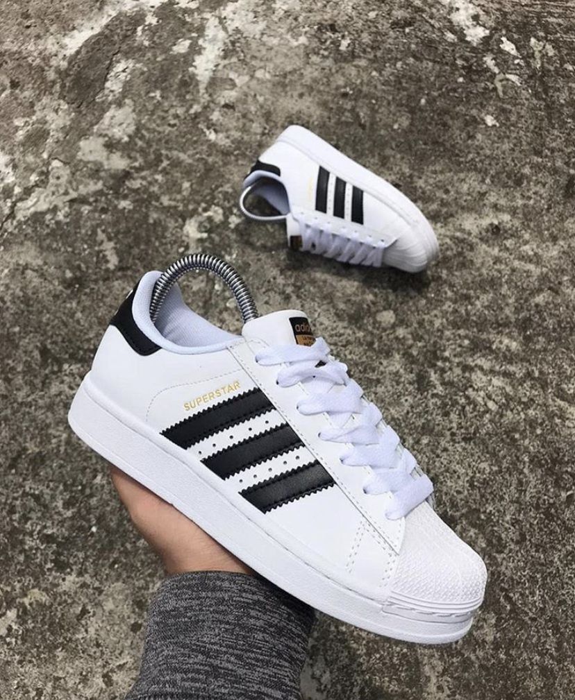 adidas com listra preta