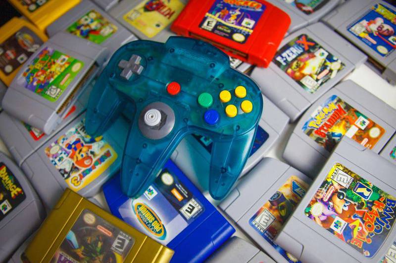 1 caixa com berço repro para jogos de nintendo 64