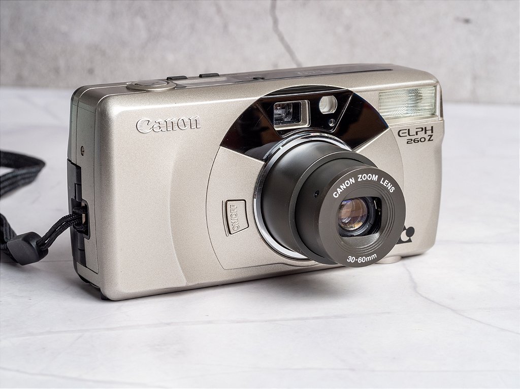 Câmera APS - Canon Elph 260Z (9.7/10) + Bateria + 1 Filme APS, Na