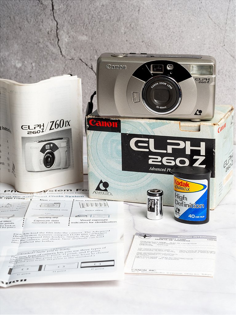 Câmera APS - Canon Elph 260Z (9.7/10) + Bateria + 1 Filme APS, Na