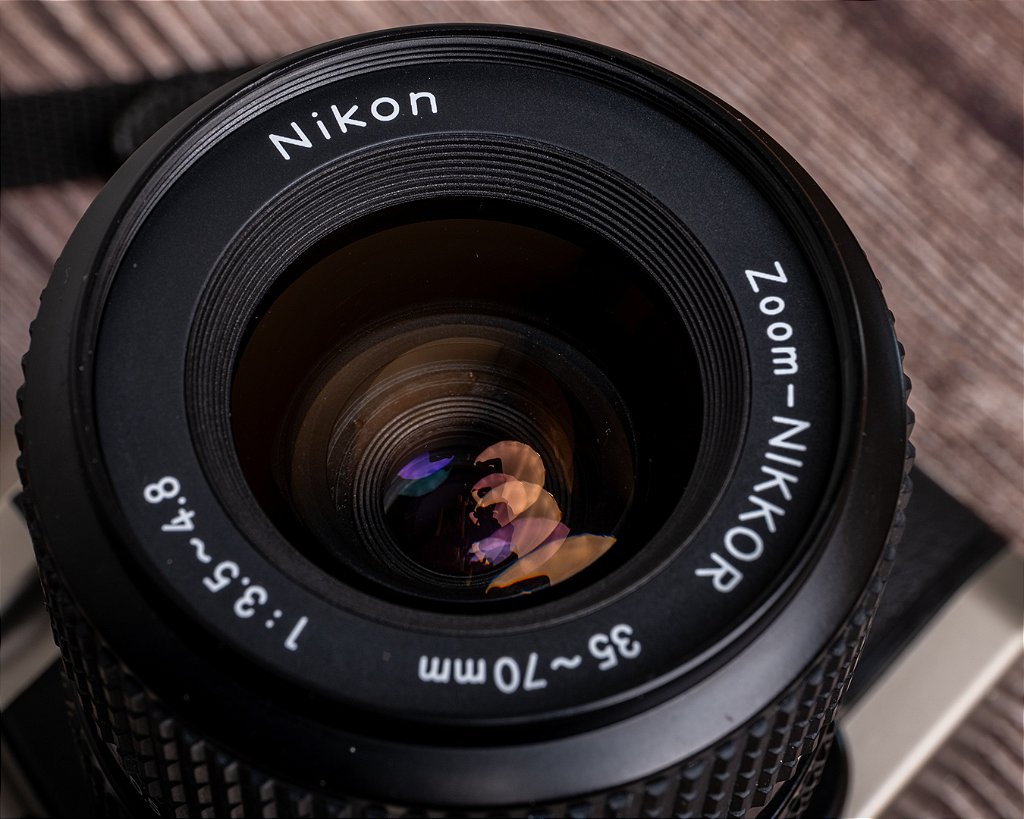 Câmera 35mm - Nikon FM10 (9.9/10) + Lente 35-70mm + Acessórios +