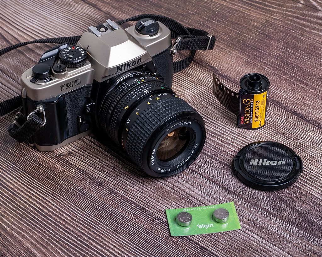 Câmera 35mm - Nikon FM10 (9.9/10) + Lente 35-70mm +