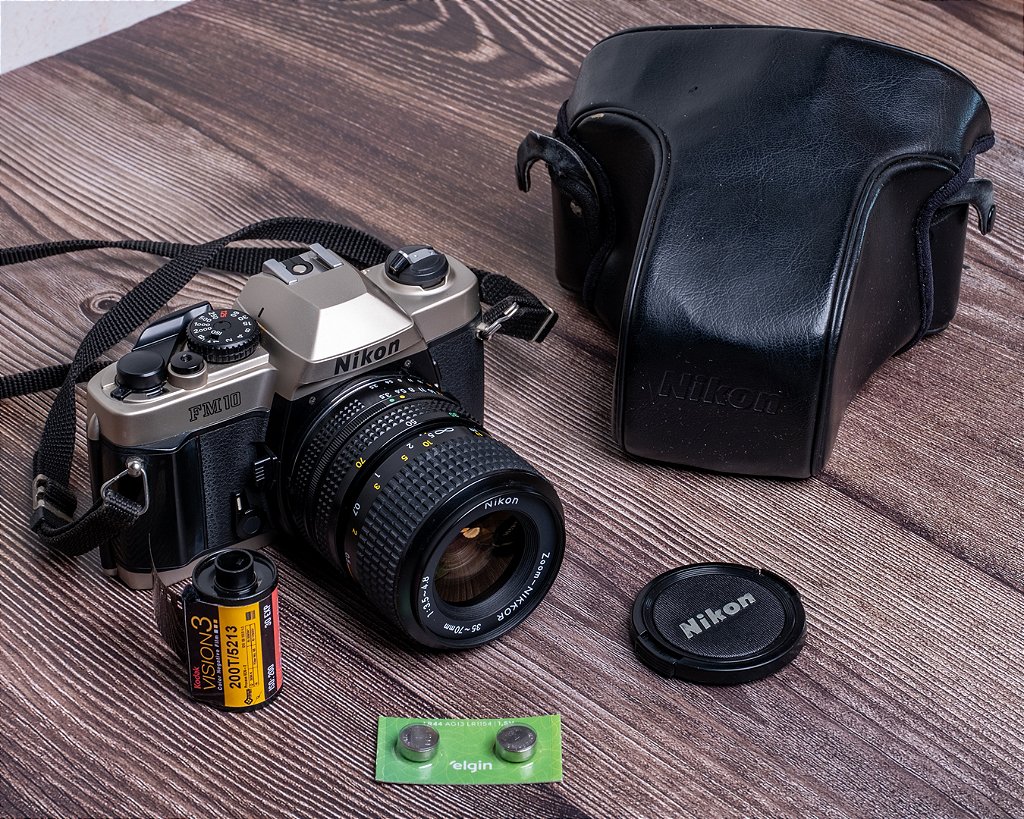 Cool Design ショップ 　Nikon FM10 35〜70mm Câmera 35mm - Nikon FM10 (9.9/10) + Lente 35-70mm + Acessórios +