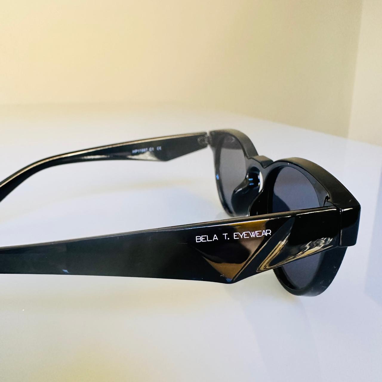 Óculos de sol Lumen plus redondo preto acetato - unissex