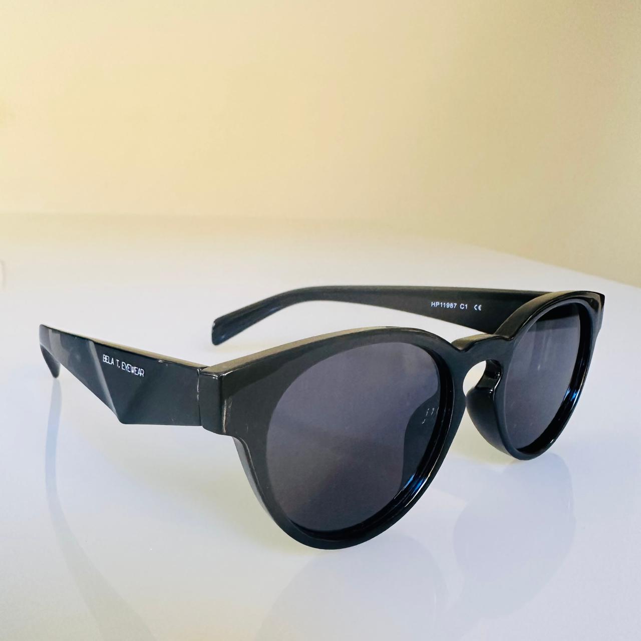 Óculos de sol Lumen plus redondo preto acetato - unissex