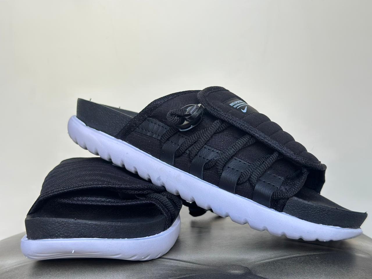 Chinelo Asuna Slide Nike Preto/Branco Nacional .