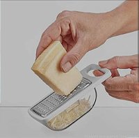 Mini Ralador com Coletor Hauskraft – Aço Inoxidável e Poliestireno | 13,5x6x4cm