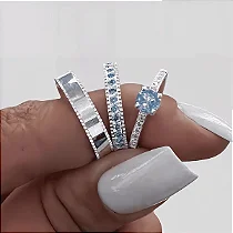 Par Aliança Brilho Azul Cravejado 15 pedras com solitario
