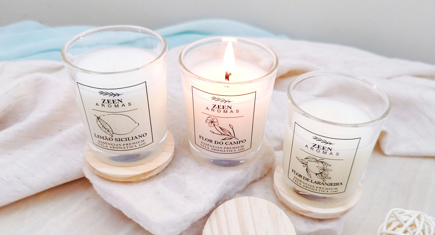 Três velas aromáticas Zeen Aromas com tampas de madeira