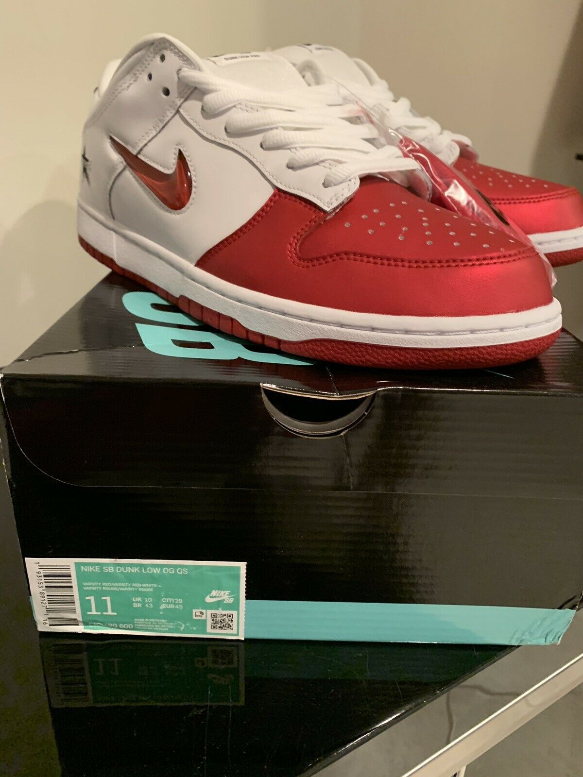Nike SB Dunk Low Supreme Jewel Swoosh Branco/Vermelho Nike SB Dunk Low Supreme Jewel Swoosh Branco/Vermelho
