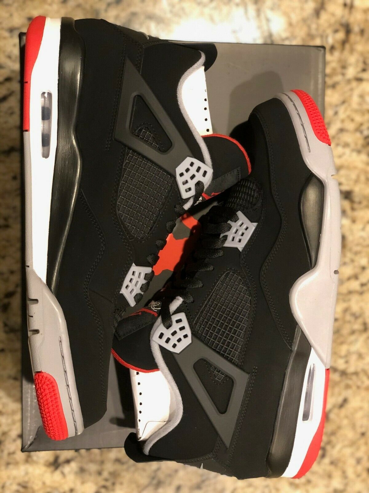 Air Jordan 4 Retro Bred - Boutique ZeroUm | Conceito Hype de A-Z