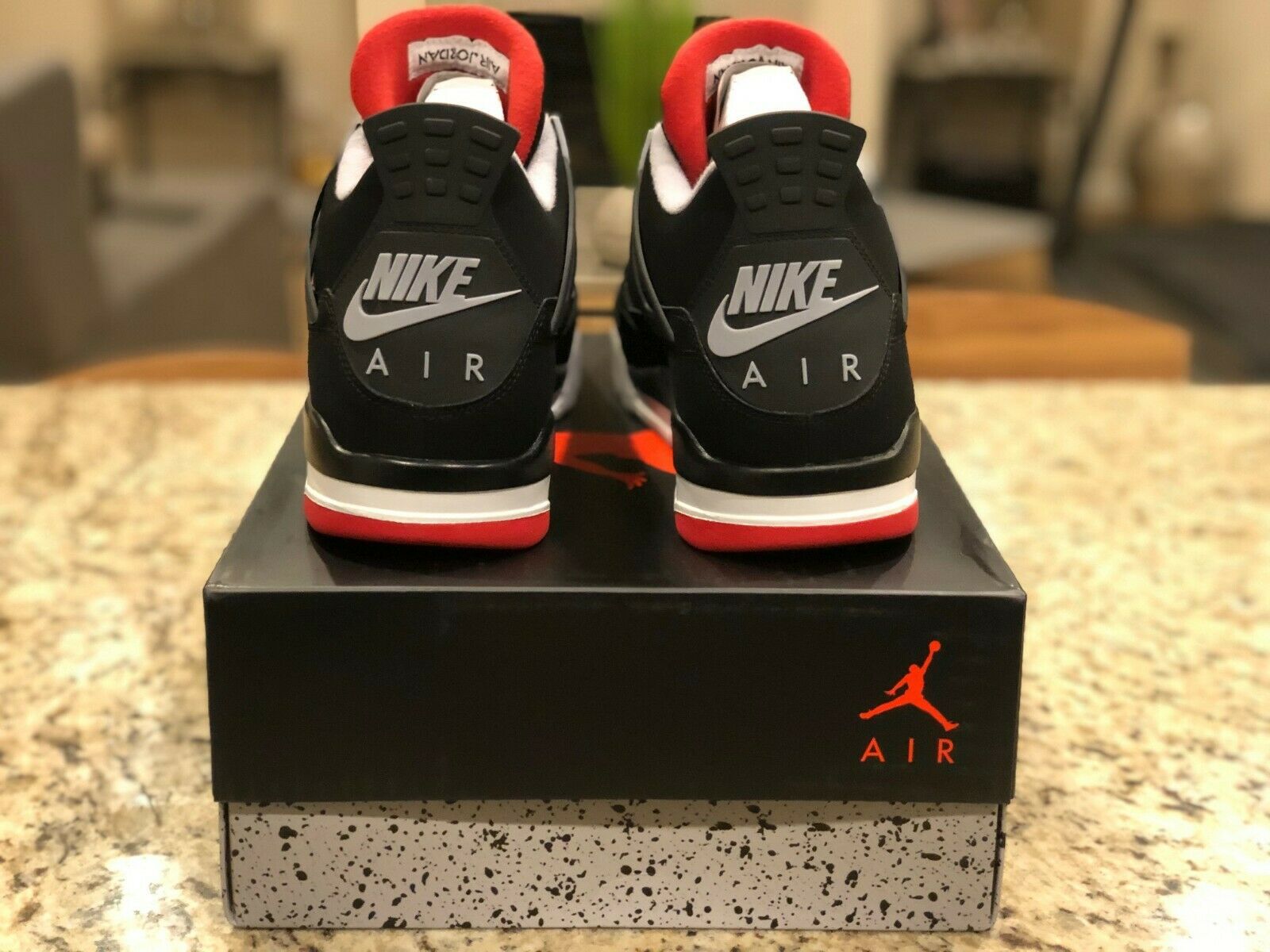 Air Jordan 4 Retro Bred - Boutique ZeroUm | Conceito Hype de A-Z