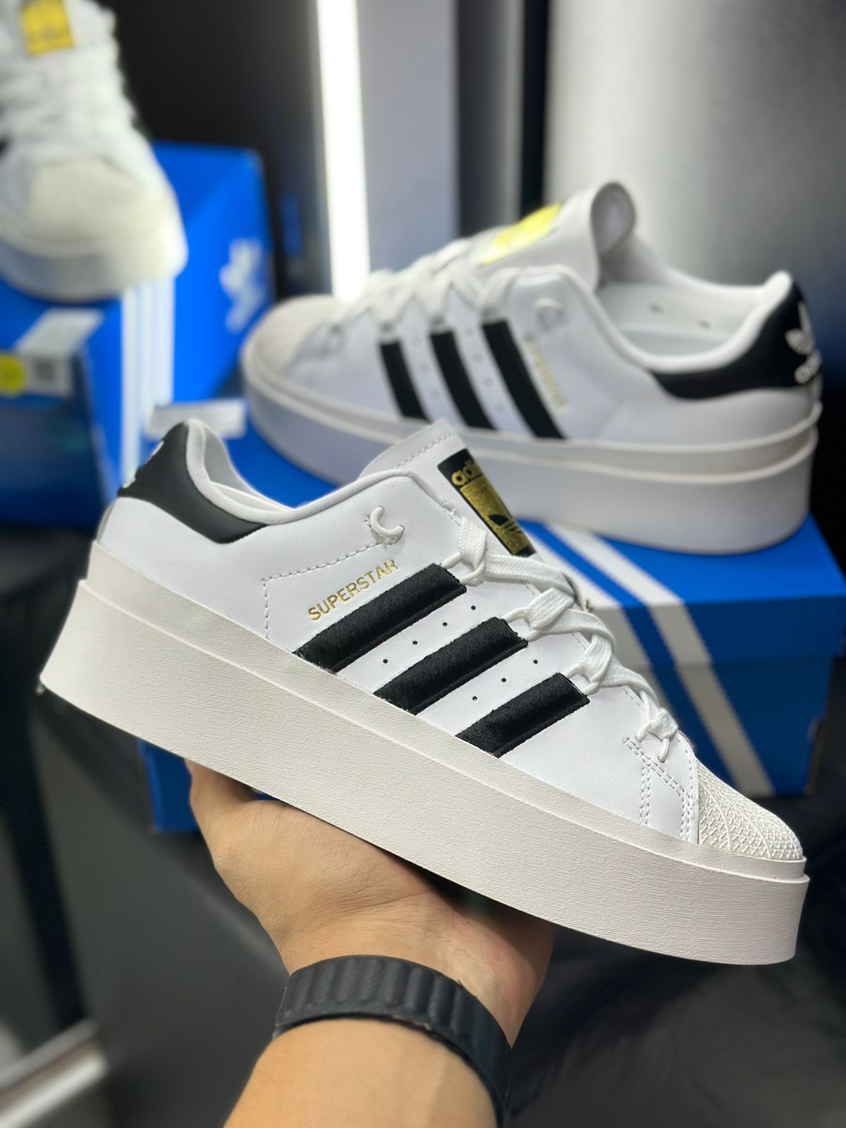 Preços baixos em Adidas Superstar