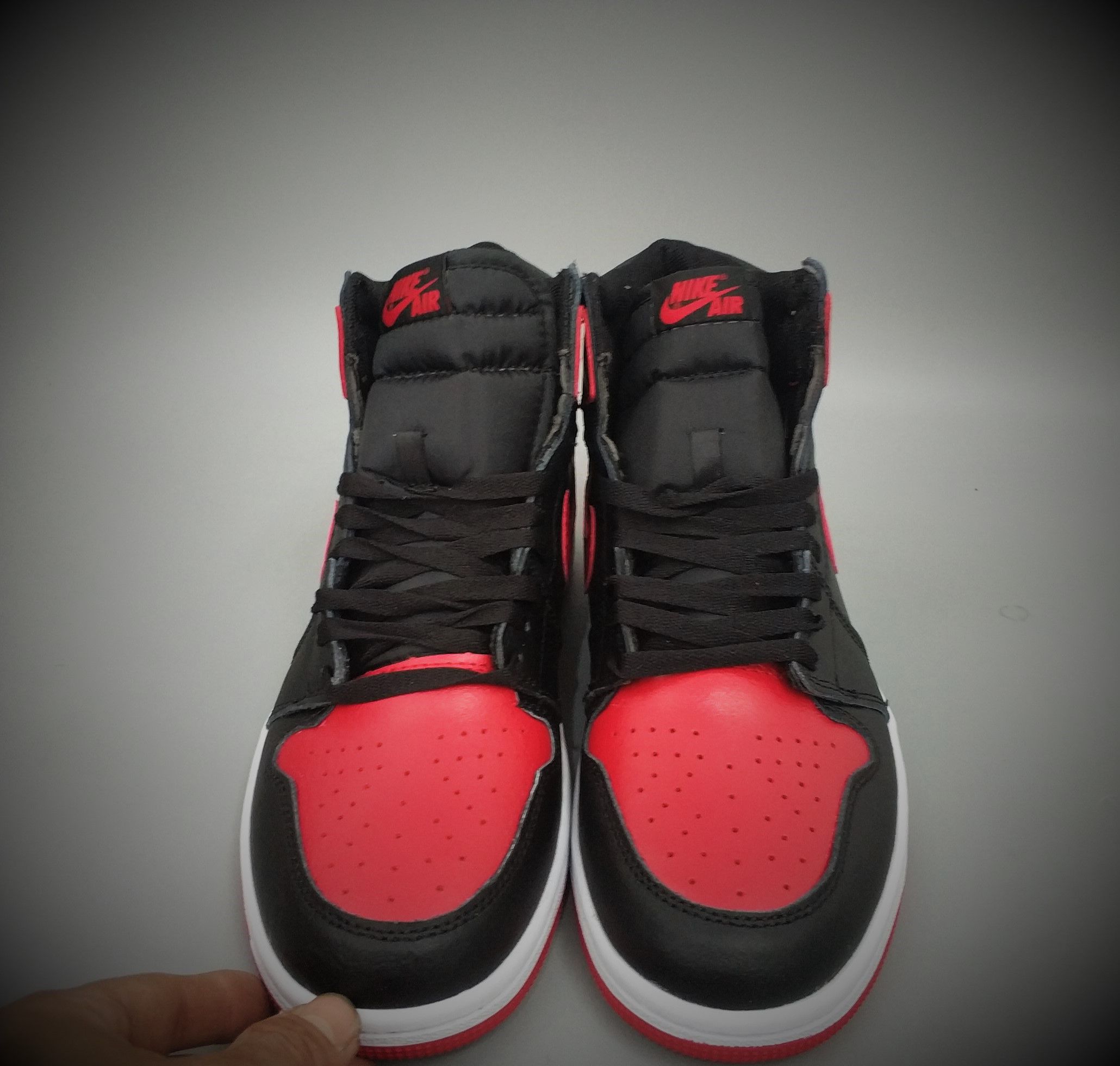 Tênis Nike Air Jordan 1 Retro High OG 'Bred Banned' PK Tênis Nike Air Jordan 1 Retro High OG 'Bred Banned' PK