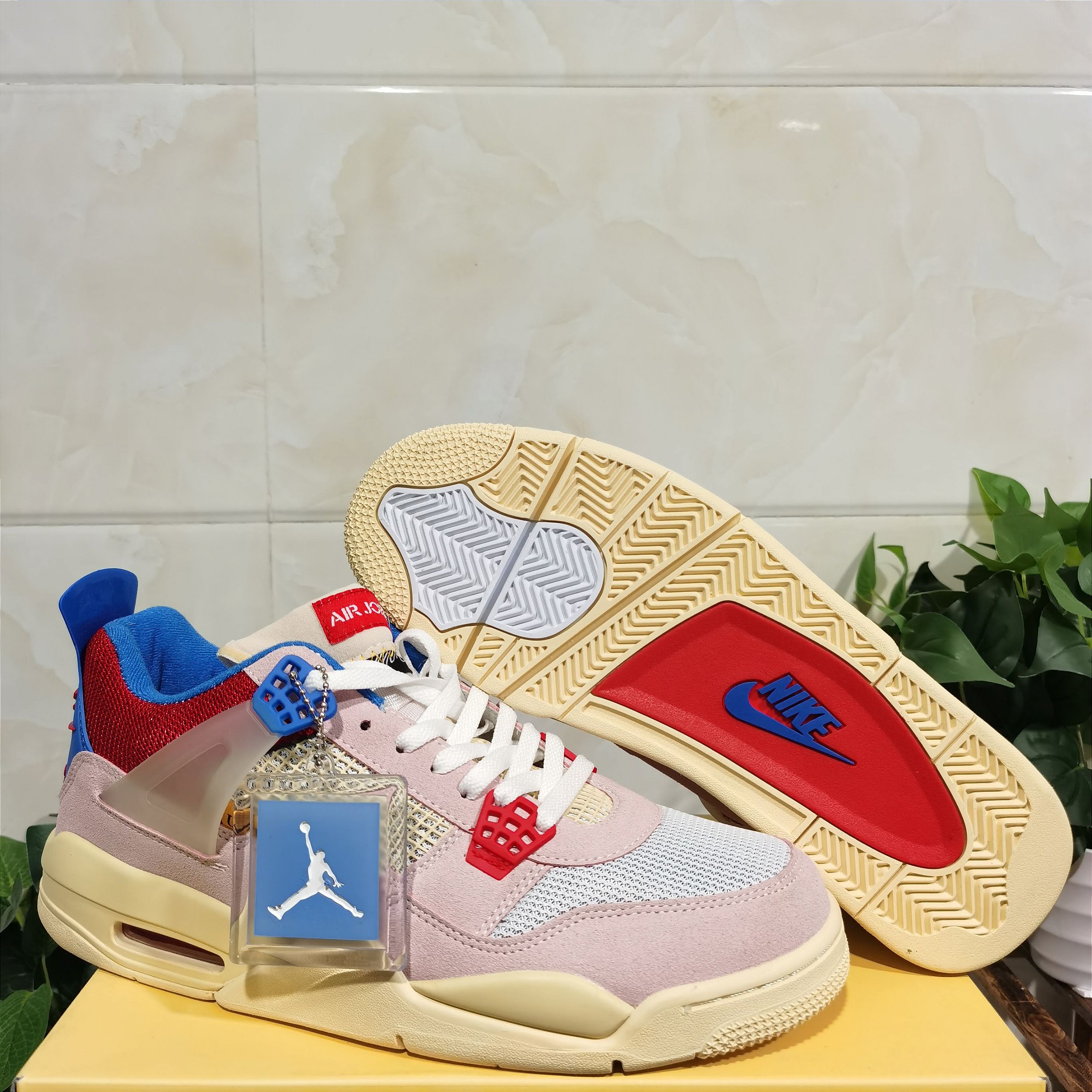 Tênis Nike Air Jordan 4 Retro Union 'Guava Ice' PK