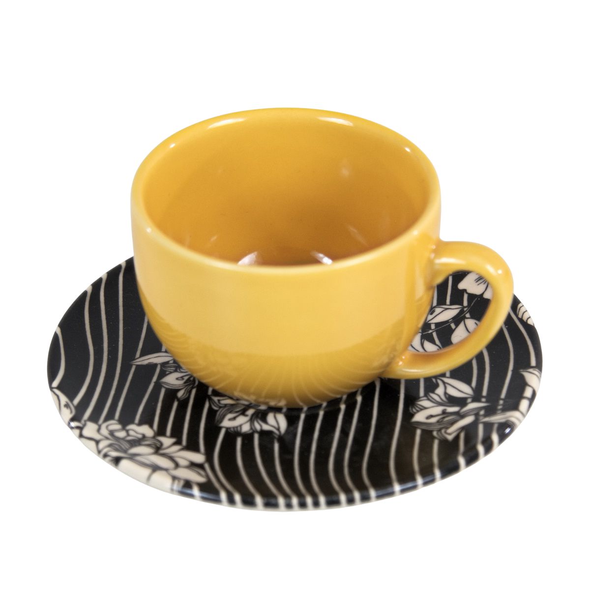 Jogo de chá com padrão floral e chávena com pires.