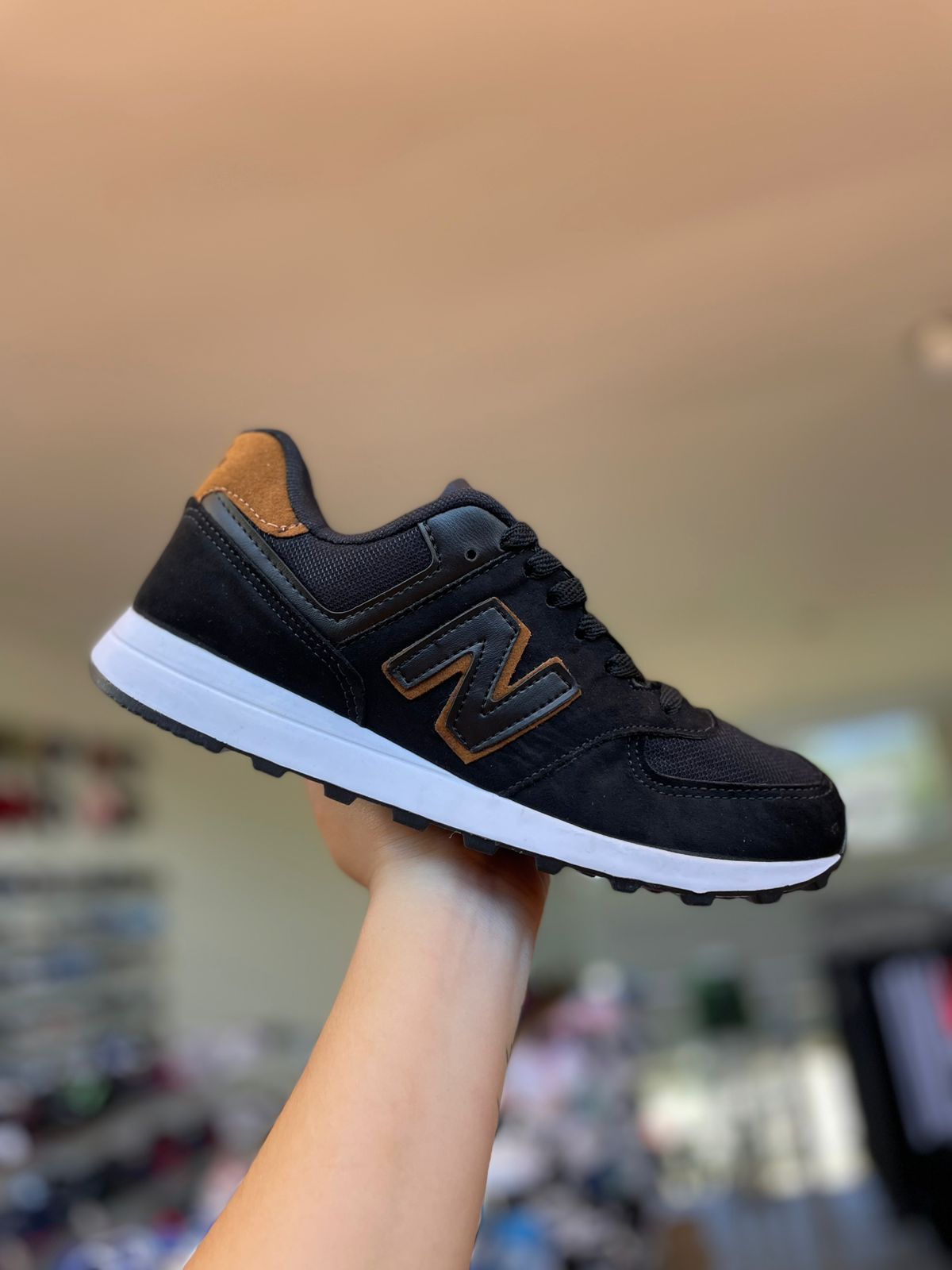 New Balance 574 Preto e Marrom Moda Bras