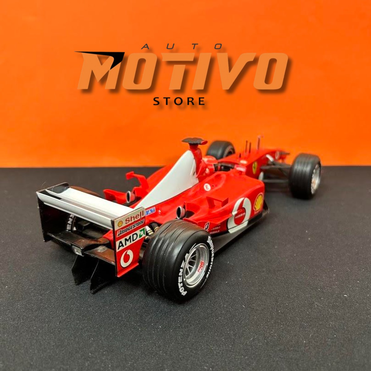 Miniatura Formula 1 Ferrari F-2002 Michael Schumacher 1/18