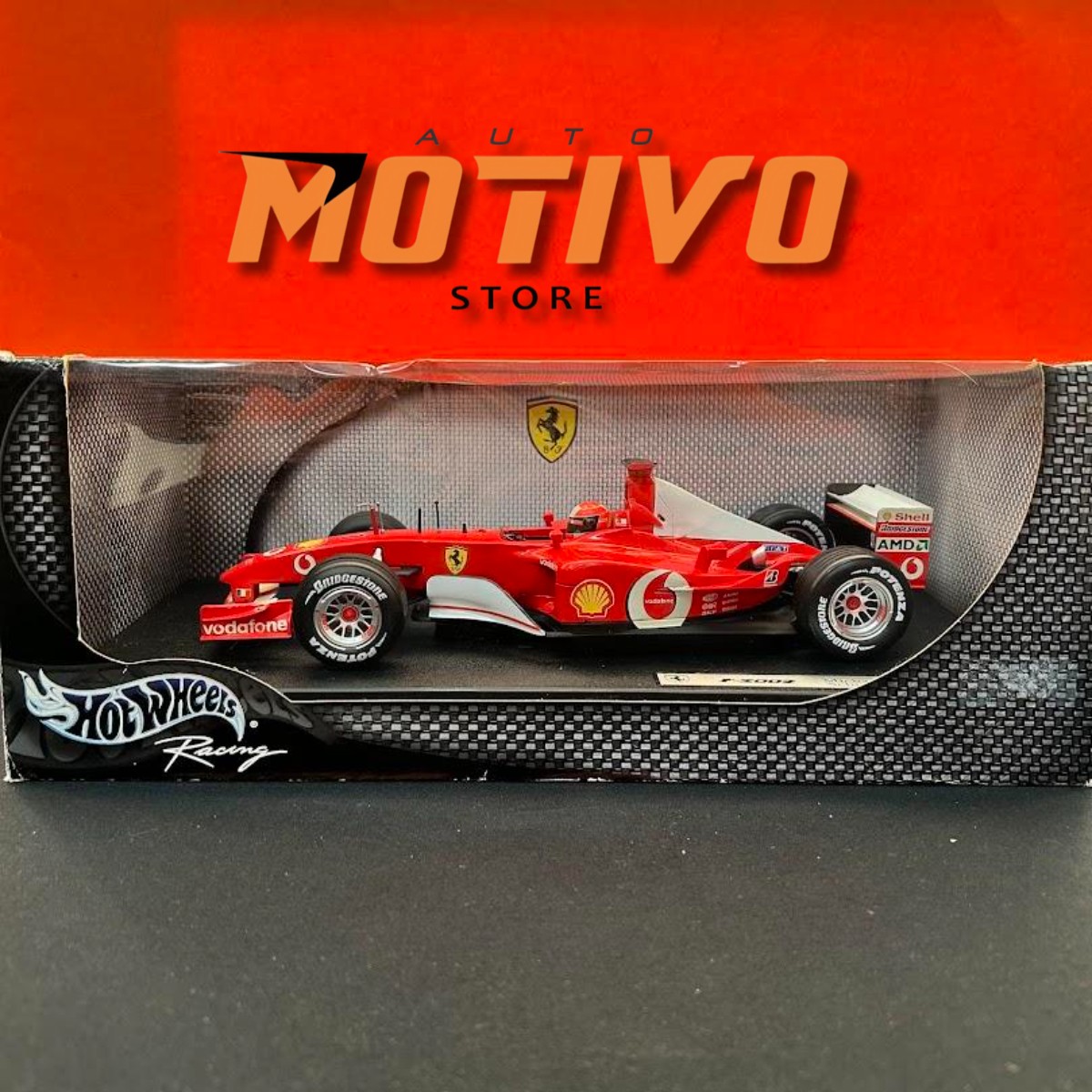 Miniatura Formula 1 Ferrari F-2002 Michael Schumacher 1/18