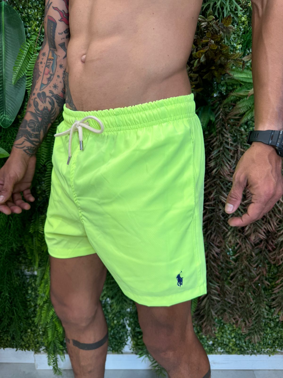 Short verde fosforescente cheap