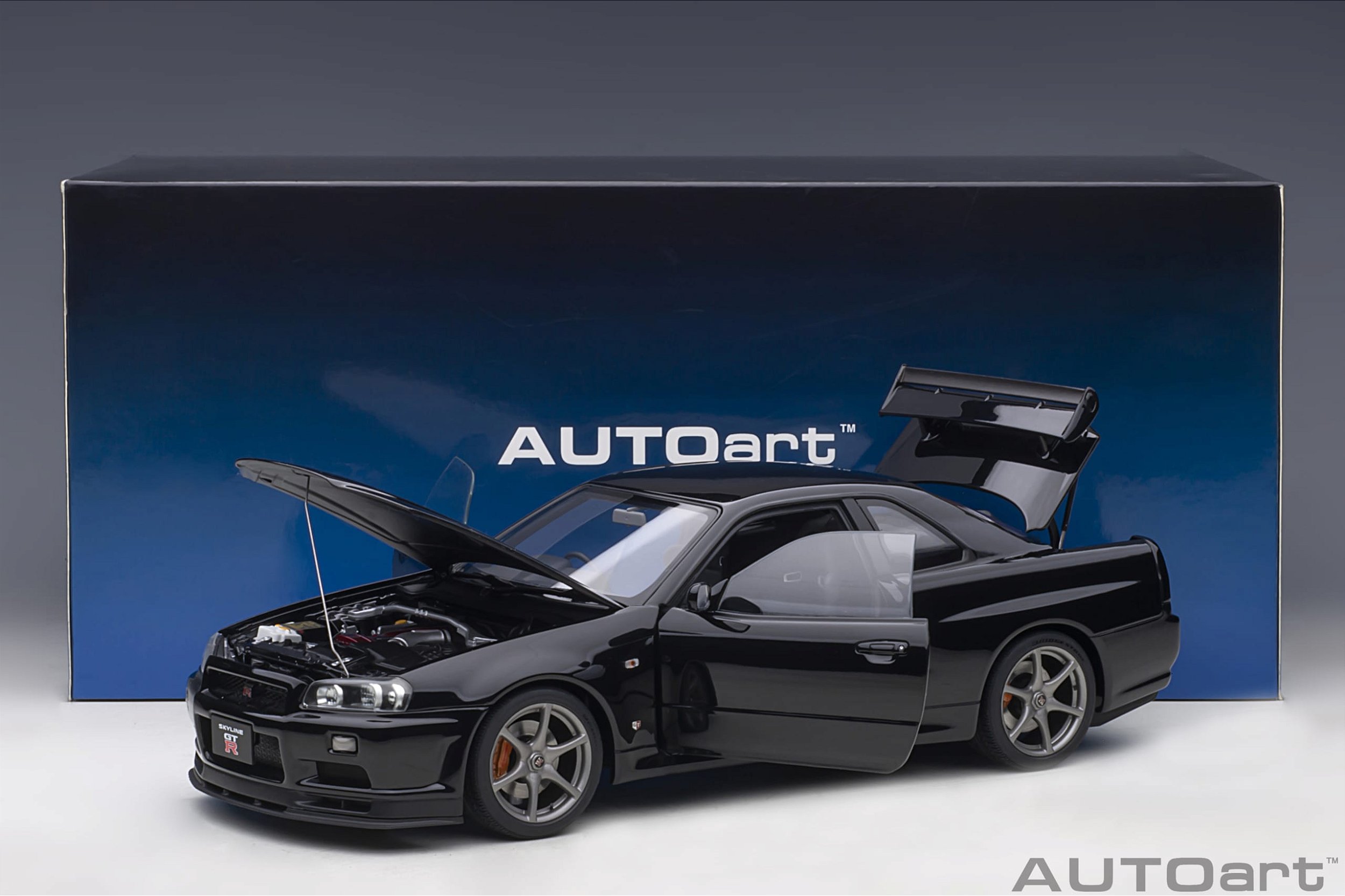 Nissan Skyline GT-R (R34) V-Spec II 1:18 Autoart Preto - 18