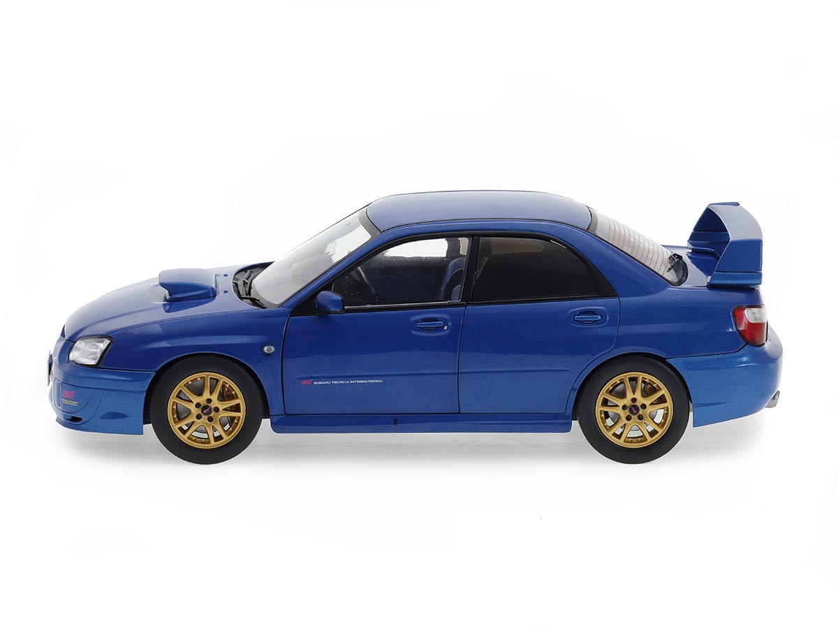 ミニカー Autoart 1/18 Subaru Impreza WRX STi 2003 Subaru Impreza WRX STI 2003 1:18 Solido Azul - 19 anos! Loja on
