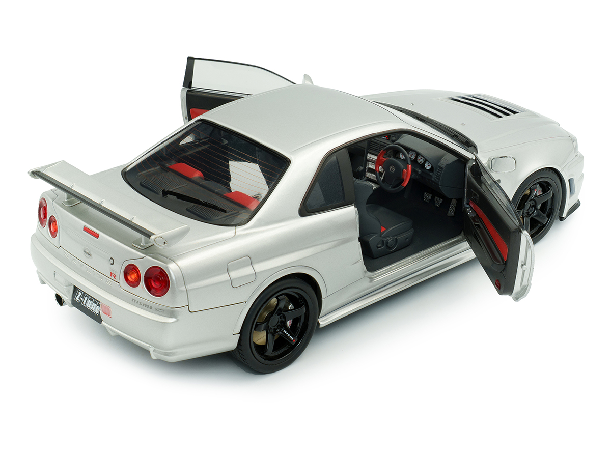 Nissan Skyline (R34) GT-R Z Tune 1999 1:18 Solido Prata - 20 anos