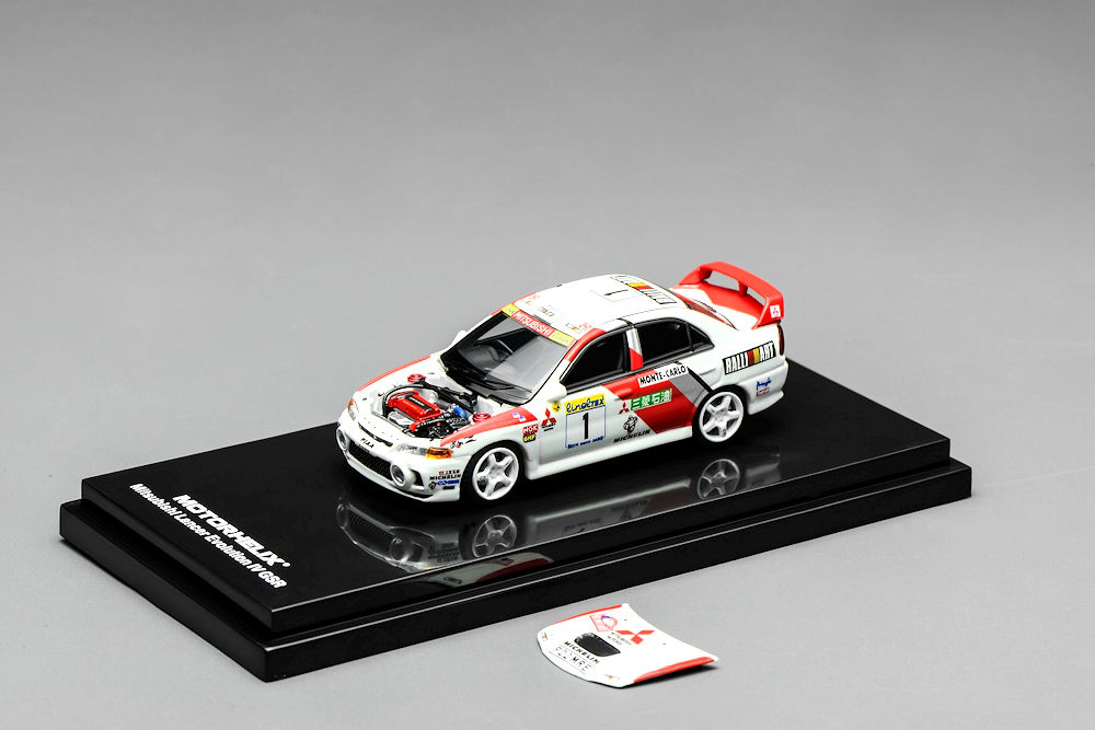 Set Mitsubishi Lancer Evolution IV GSR 1:64 MOTORHELIX HEC 2026