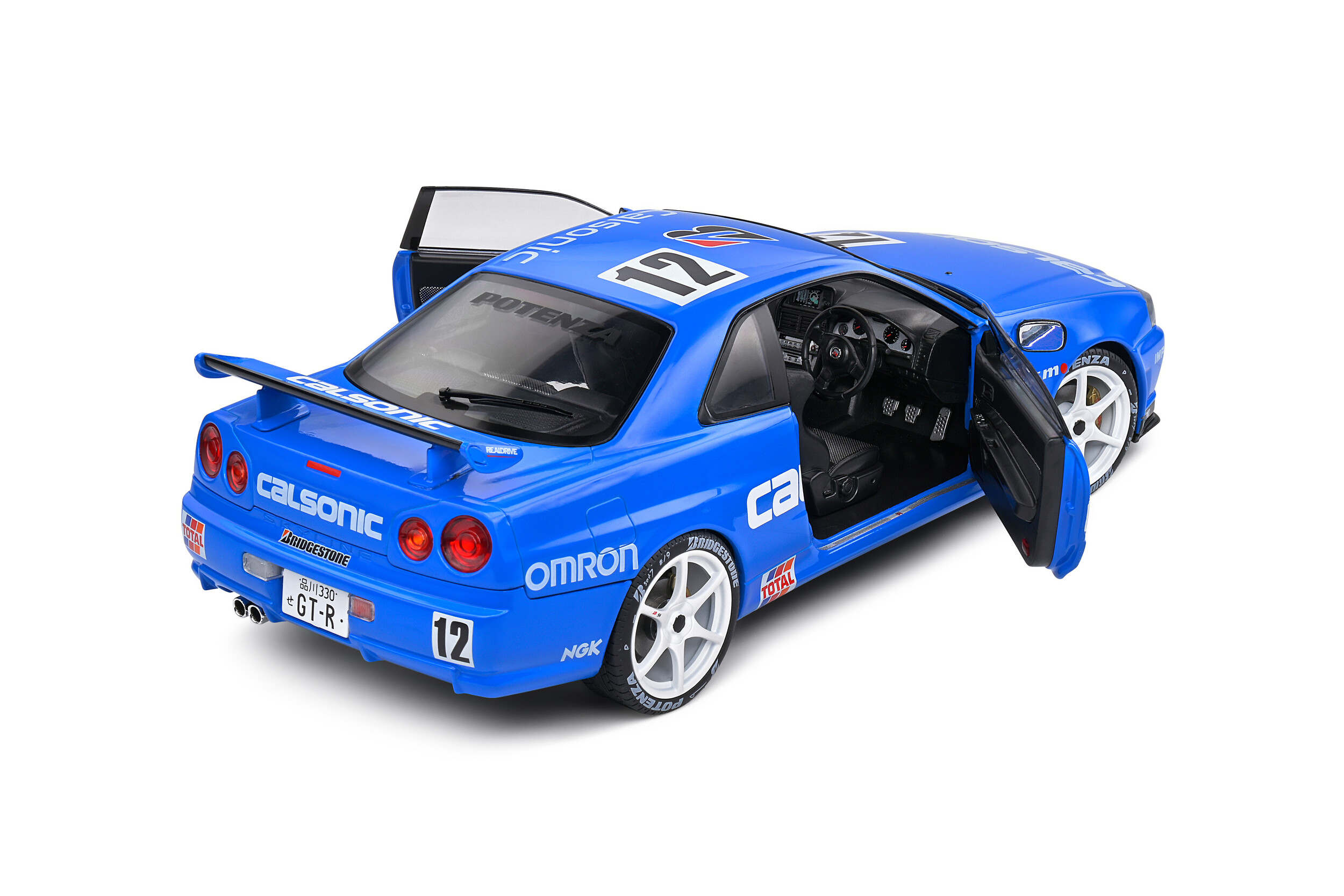 Nissan Skyline GT-R (R34) Tributo Calsonic 2000 Azul 1:18 Solido