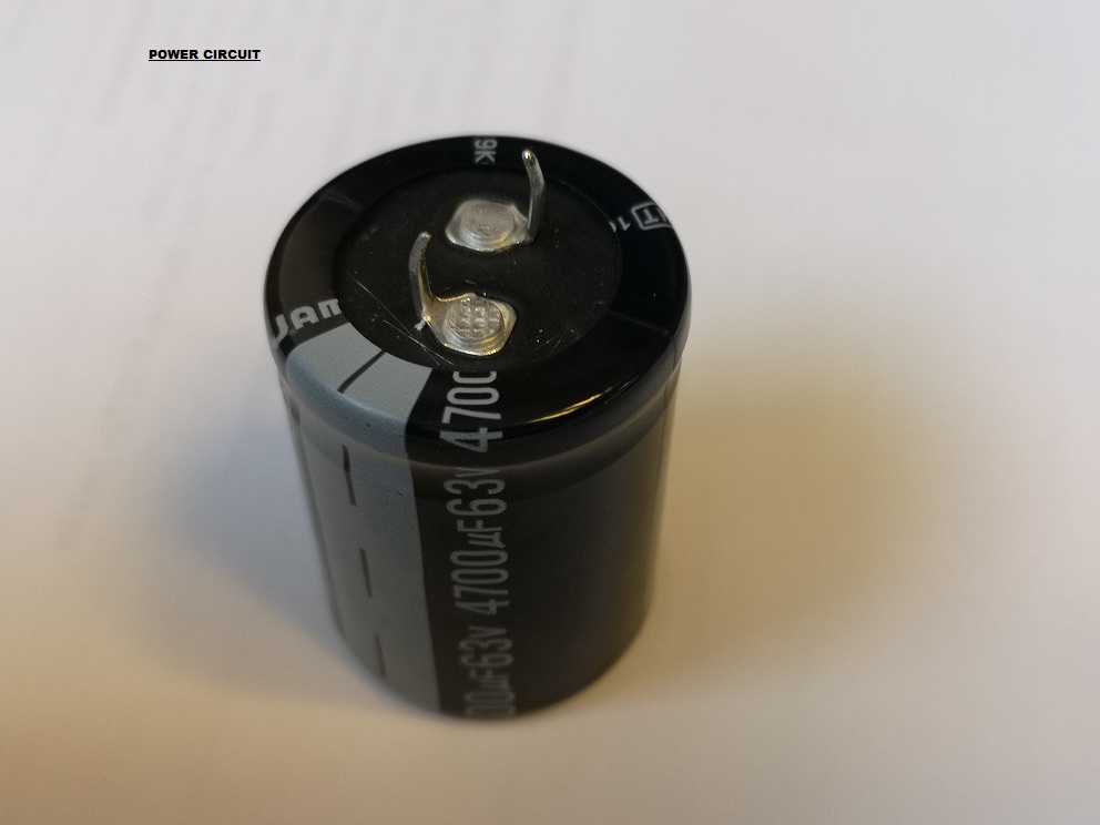Condensator - Condensator, Type: Radiaal Elco - 0.47µF, Spanning: 63V