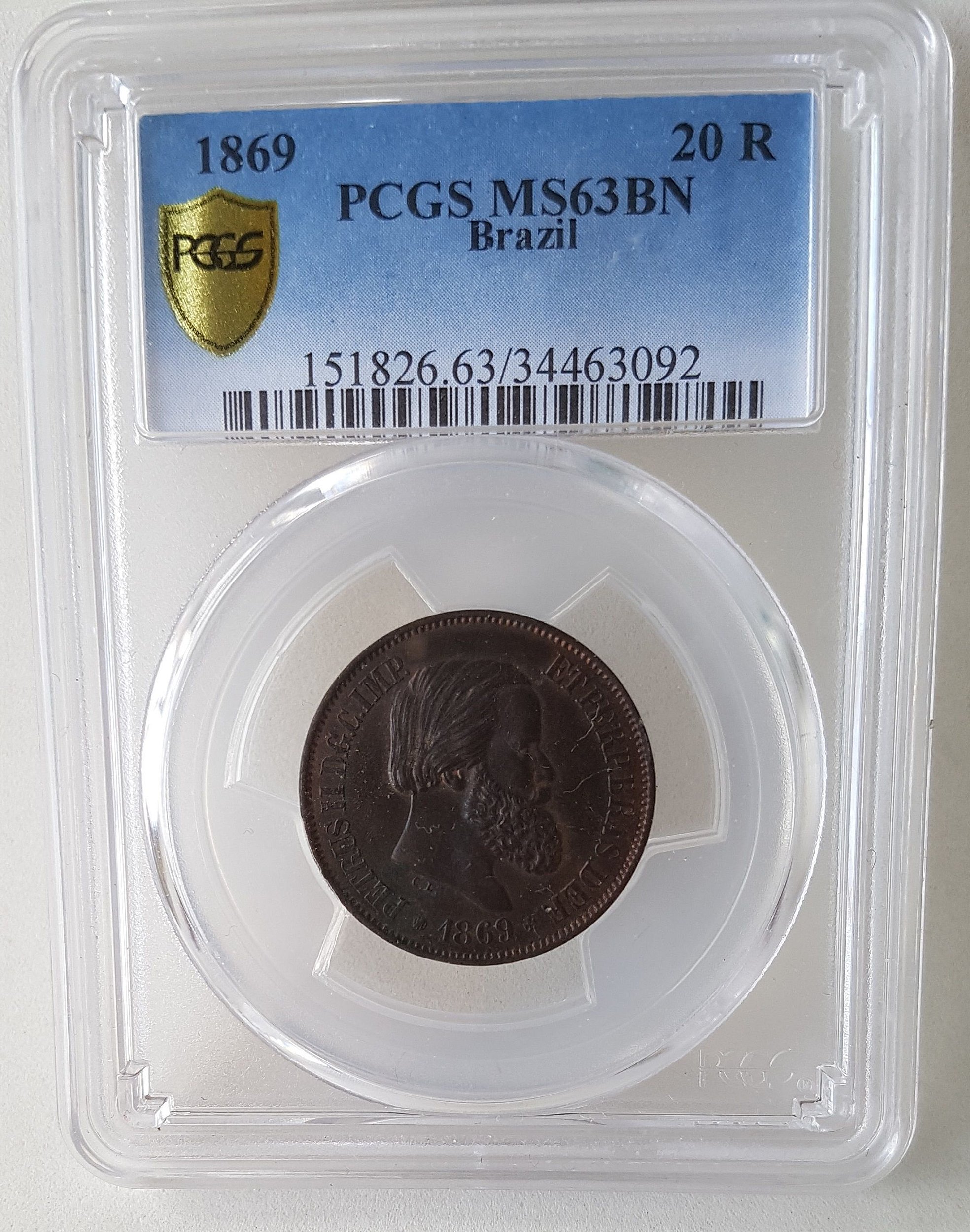 Moeda Certificada PCGS MS63 20 Réis Bronze Império 1869R Flor de Cunho 