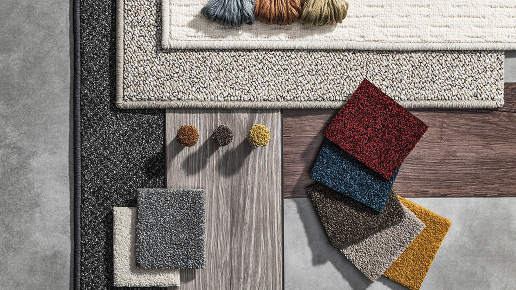 Amostras de carpetes Belgotex em diversas cores e texturas para harmonização de projetos de decoração