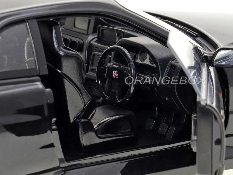 Nissan Skyline GT-R (R34) 1999 1:18 Greenlight Preto - 20 anos