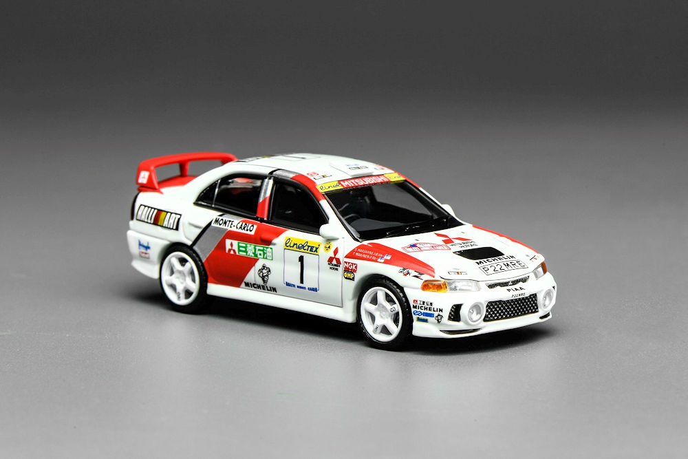 Set Mitsubishi Lancer Evolution IV GSR 1:64 MOTORHELIX HEC 2026
