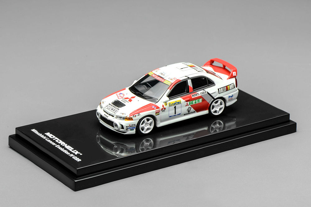 Set Mitsubishi Lancer Evolution IV GSR 1:64 MOTORHELIX HEC 2026