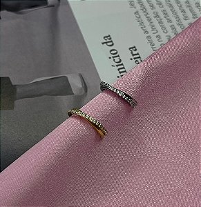 Argola segmentada conch trançada titânio