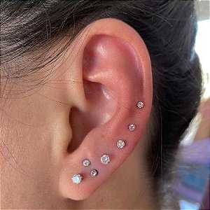 Piercing Orelha/Cartilagem Tragus Ponto de Luz Aço Cirúrgico - Loja de  Piercings