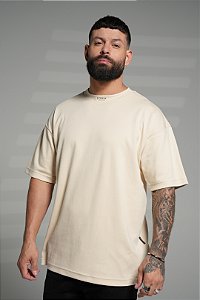 Camiseta oversized beige - micrologo na gola