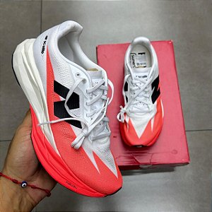 TÊNIS NEW BALANCE FUELCELL SUPERCOMP ELITE V5 URGENT RED WHITE BLACK FEMININO (COMPLETO)