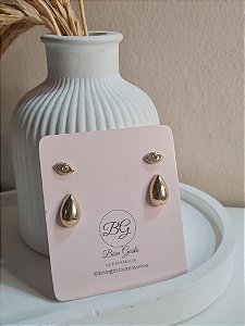 Cartela com brinco de olho grego e gotinha dourados