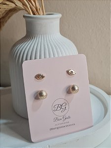 Cartela com brinco de olho grego e de bolinha texturizada dourado