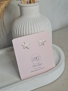 Brinco estrela do mar dourado