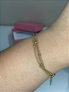 Pulseira bolinhas dourada aço inox