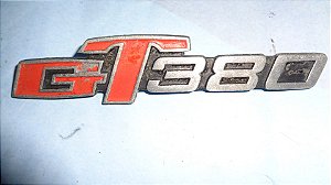 Suzuki GT 380 - Emblema METAL da tampa Usado Com Todos Pinos