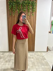 blusa com desenho de laço prata e brilhos