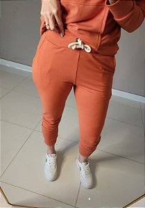 Calça jogger moletinho laranja c ilhoes e cordão